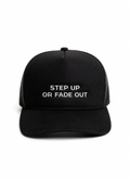 Black trucker hat with white embroidered slogan reading "STEP UP OR FADE OUT" on the front, shown against a plain white background